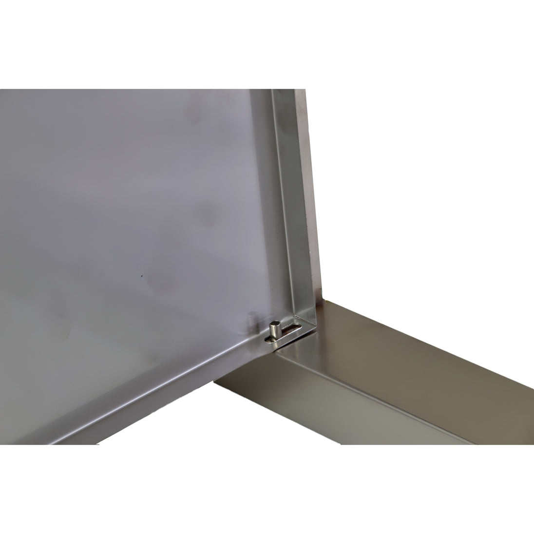 Metallic surface with a corner and a latch on a white background

