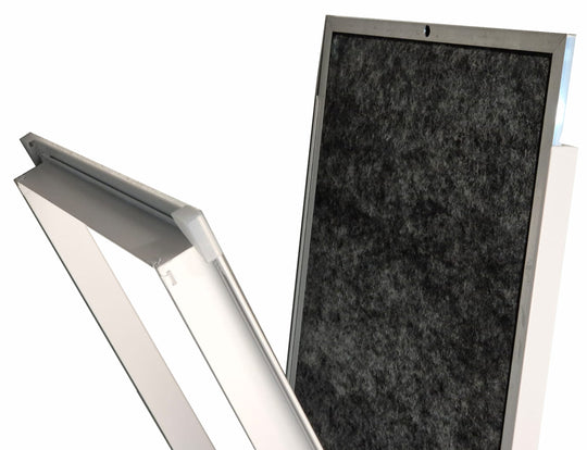 A close-up of a rectangular panel with a dark textured surface and a light gray frame, shown alongside a matching angled view of the frame on a white background.

