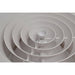 Close-up of a white ceiling vent with concentric circular design.

