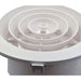 White circular air vent with concentric rings on a white background


