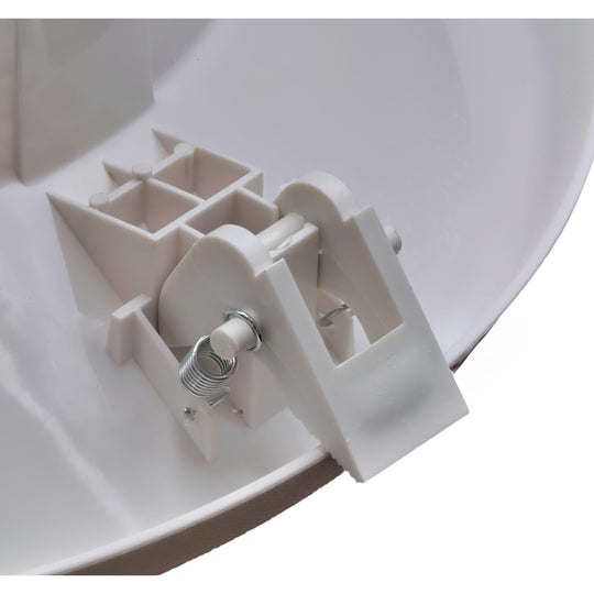 Close-up of a white plastic component on a white background

